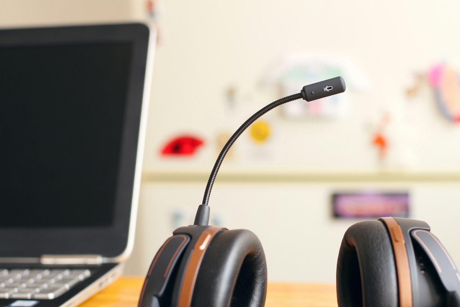 Headset beside a laptop for customer support
