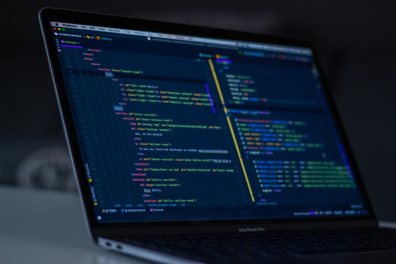 Laptop showing programming code